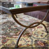 F35. Metal and glass coffee table. 17”h x 44”w x 24”d 